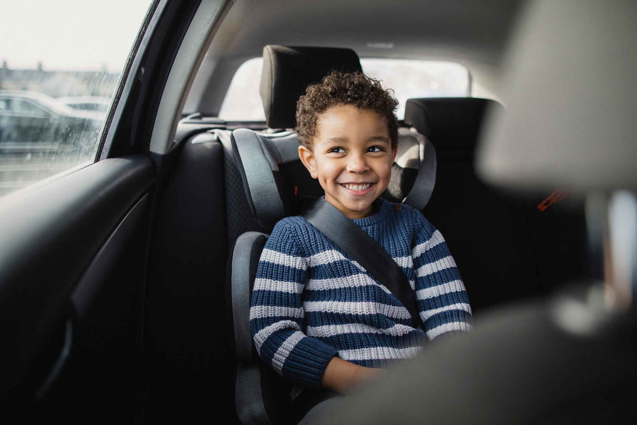 How big does a child need to be to sit in the front seat best sale